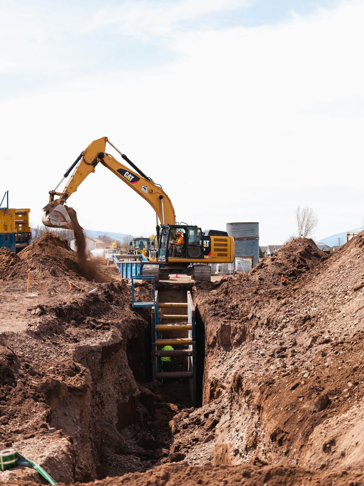 Excavator on a construction project, illustrative stock photograph